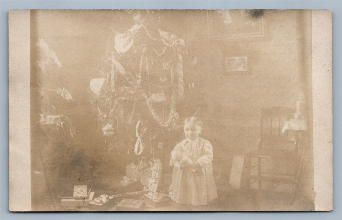 GIRL w/ DOLL UNDER CHRISTMAS TREE ANTIQUE REAL PHOTO POSTCARD RPPC