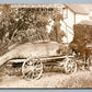 EXAGGERATED FISH BRINGING HOME ANTIQUE REAL PHOTO POSTCARD RPPC fishing