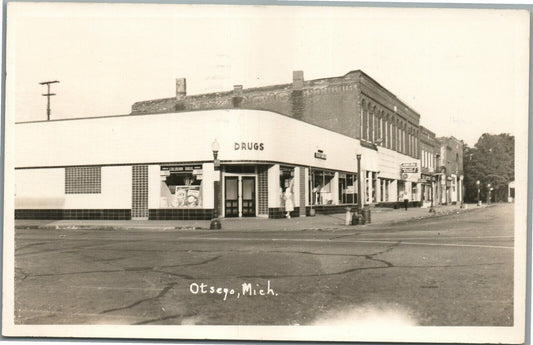 OTSEGO MI STREET SCENE w/ DRUGS STORE VINTAGE REAL PHOTO POSTCARD RPPC