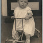 BABY GIRL w/ BICYCLE ANTIQUE REAL PHOTO POSTCARD RPPC