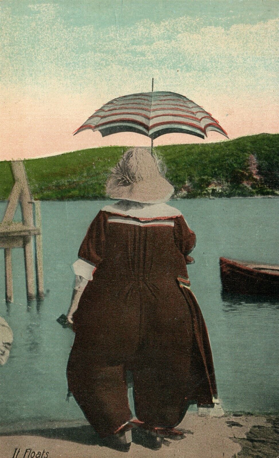 IT FLOATS COMIC 1913 ANTIQUE POSTCARD