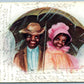 COUPLE UNDER UMBRELLA ANTIQUE POSTCARD