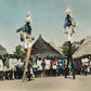 AFRICA SENEGAL DANCERS on STILTS VINTAGE HAND PAINTED REAL PHOTO POSTCARD RPPC