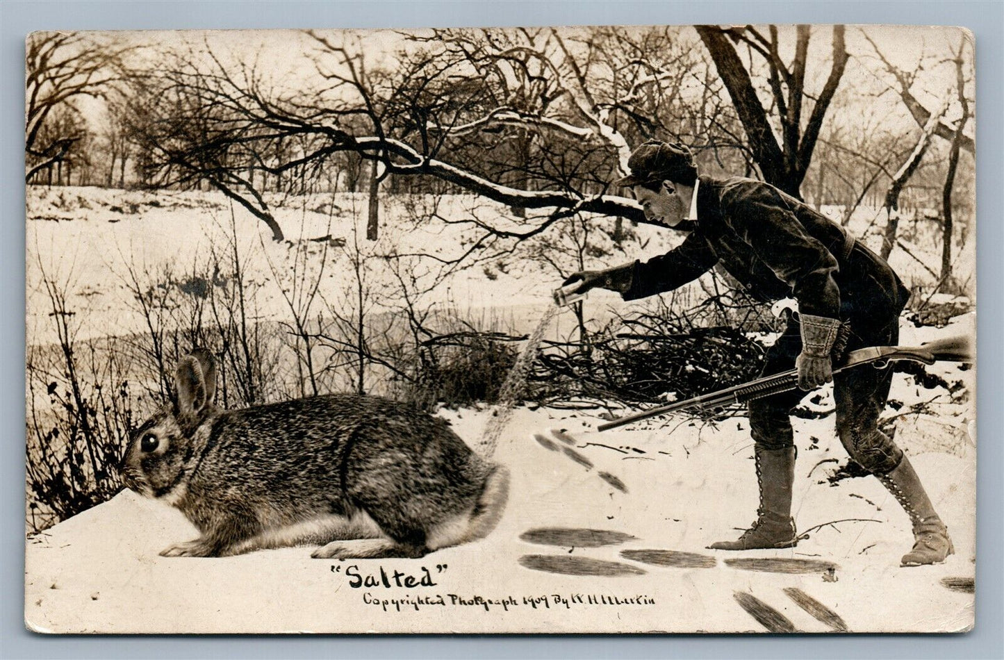 EXAGGERATED RABBIT HUNTING ANTIQUE REAL PHOTO POSTCARD RPPC w/ CORK CANCEL