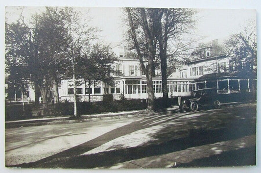 RPPC VINTAGE PHOTO POSTCARD - STREET SCENE w/ OLD CAR