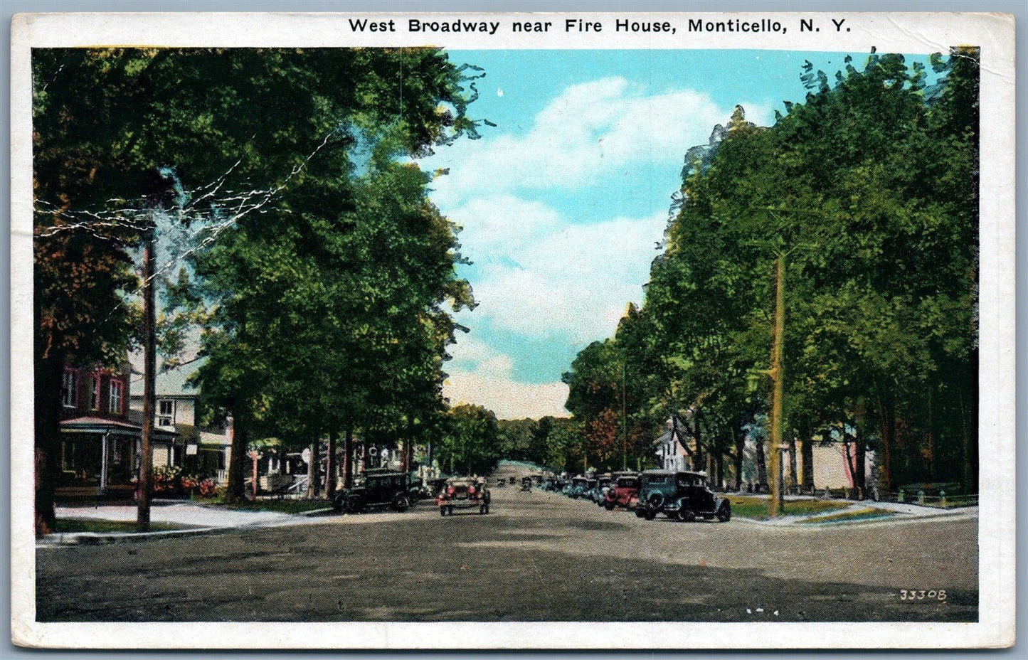 MONTICELLO SULLIVAN CO. NY WEST BROADWAY NEAR FIRE HOUSE 1933 ANTIQUE POSTCARD