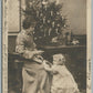 MOTHER & DAUGHTER UNDER CHRISTMAS TREE ANTIQUE REAL PHOTO POSTCARD RPPC