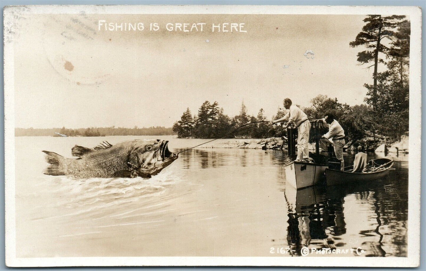 FISHING IS GREAT HERE ANTIQUE 1913 EXAGGERATED REAL PHOTO POSTCARD RPPC