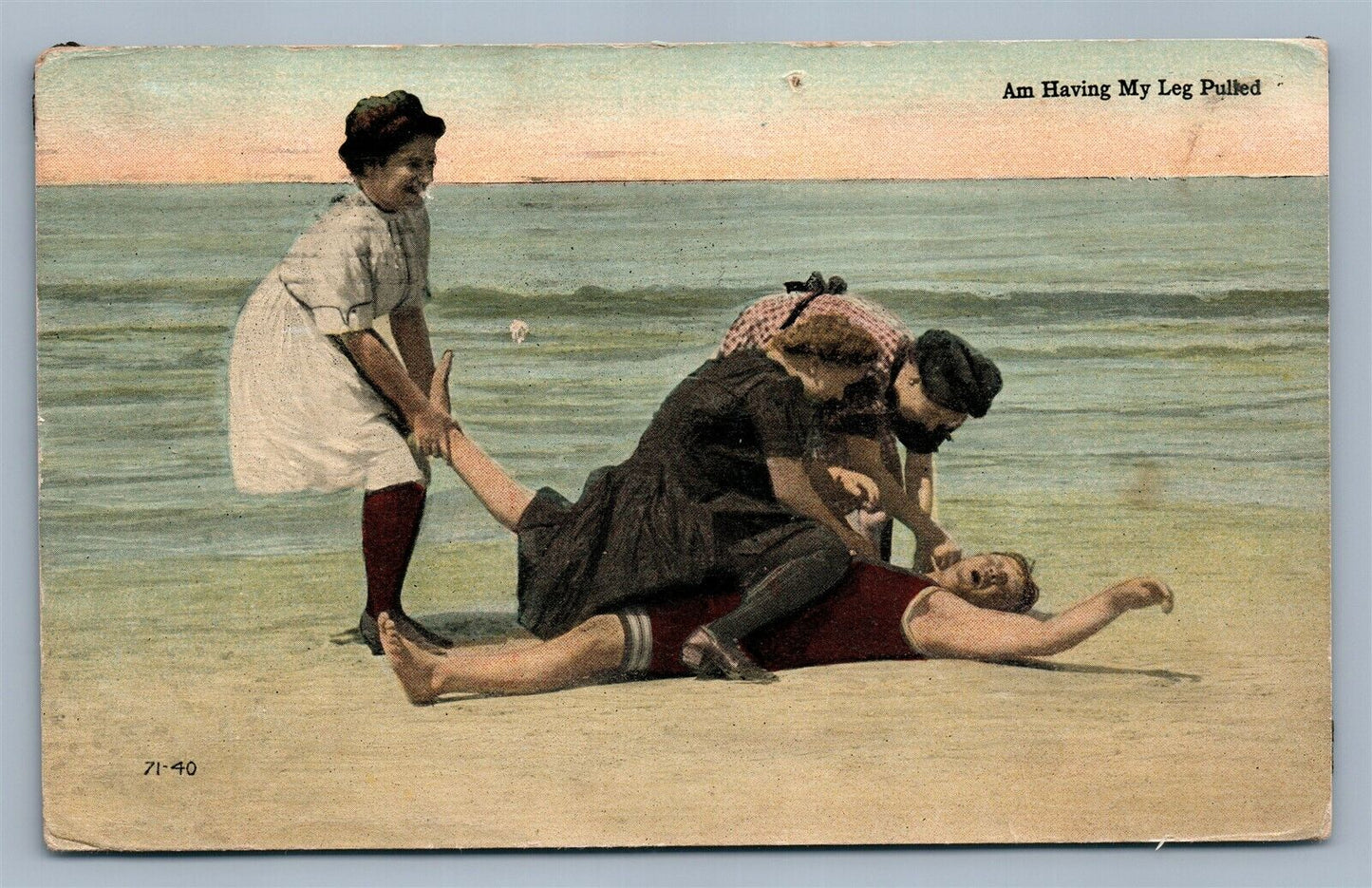 LIFE SAVING ON THE BEACH ANTIQUE POSTCARD