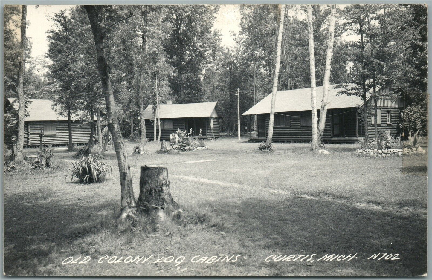 CURTIS MI OLD COLONY LOG CABINS VINTAGE REAL PHOTO POSTCARD RPPC