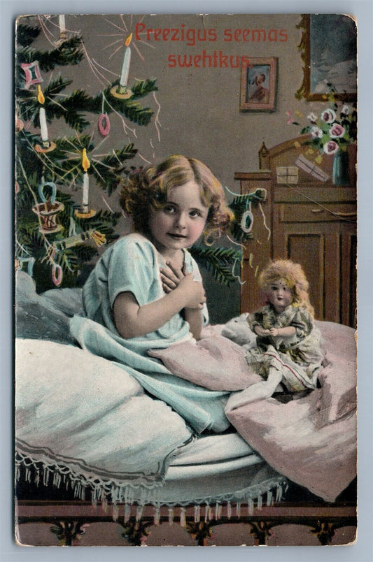 GIRL w/ DOLL & CHRISTMAS TREE ANTIQUE LATVIAN POSTCARD PREEZIGUS SEEMAS SWENTKUS