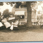 RELAXING ON THE BACK YARD - WHEELCHAIR ANTIQUE REAL PHOTO POSTCARD RPPC