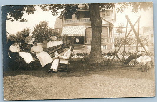 RELAXING ON THE BACK YARD - WHEELCHAIR ANTIQUE REAL PHOTO POSTCARD RPPC