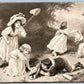 KIDS w/ DOG CATCHING BUTTERFLY ANTIQUE POSTCARD