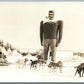 PAUL BUNYAN DOG SLEDDING VINTAGE REAL PHOTO POSTCARD RPPC