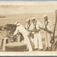 USS KANSAS CANNON CREW ANTIQUE REAL PHOTO POSTCARD RPPC w/ SHIP CANCEL