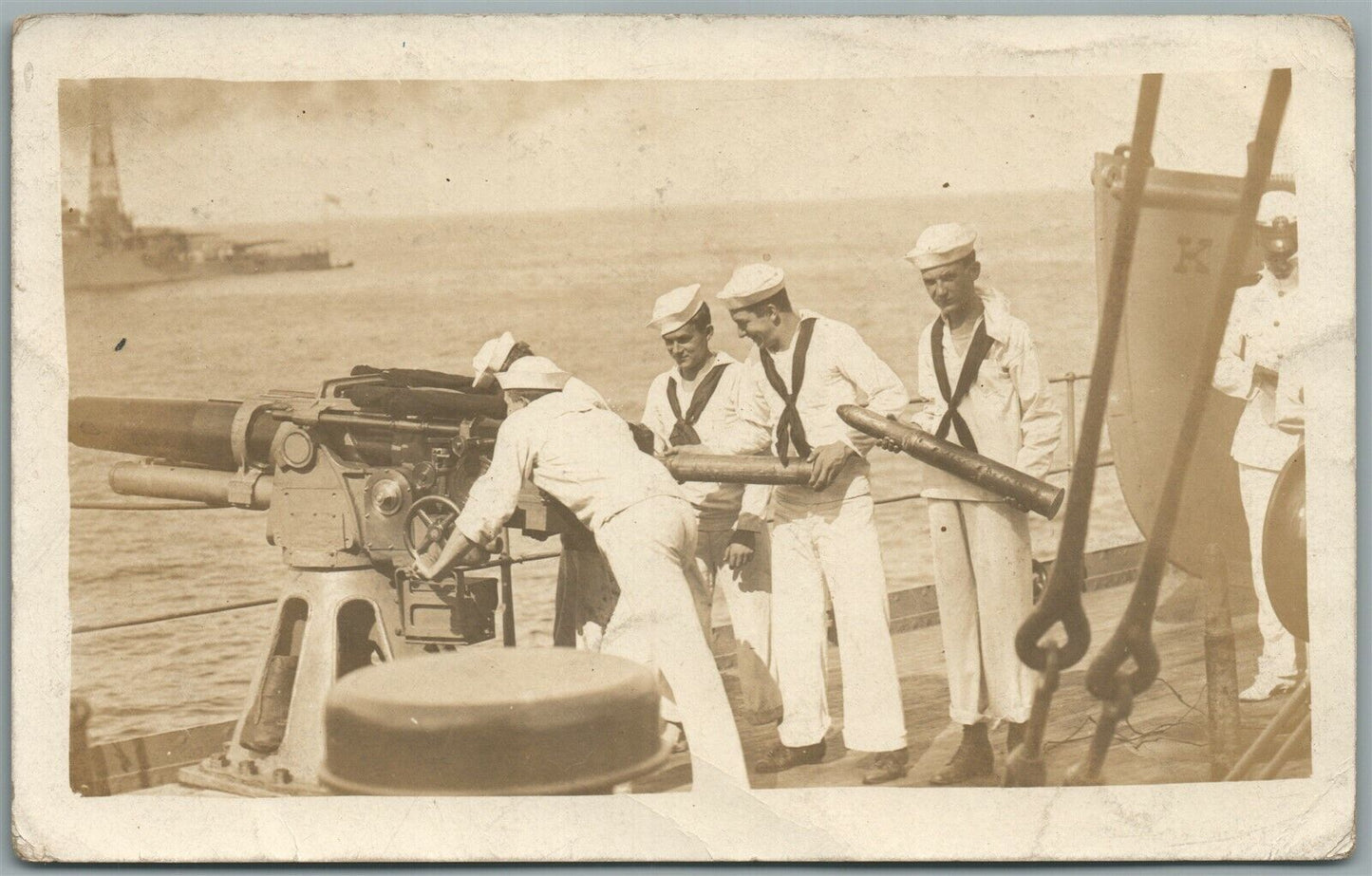 USS KANSAS CANNON CREW ANTIQUE REAL PHOTO POSTCARD RPPC w/ SHIP CANCEL