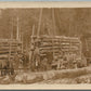 WOOD LOGS on RAILROAD CARS lumberjacks ANTIQUE REAL PHOTO POSTCARD RPPC