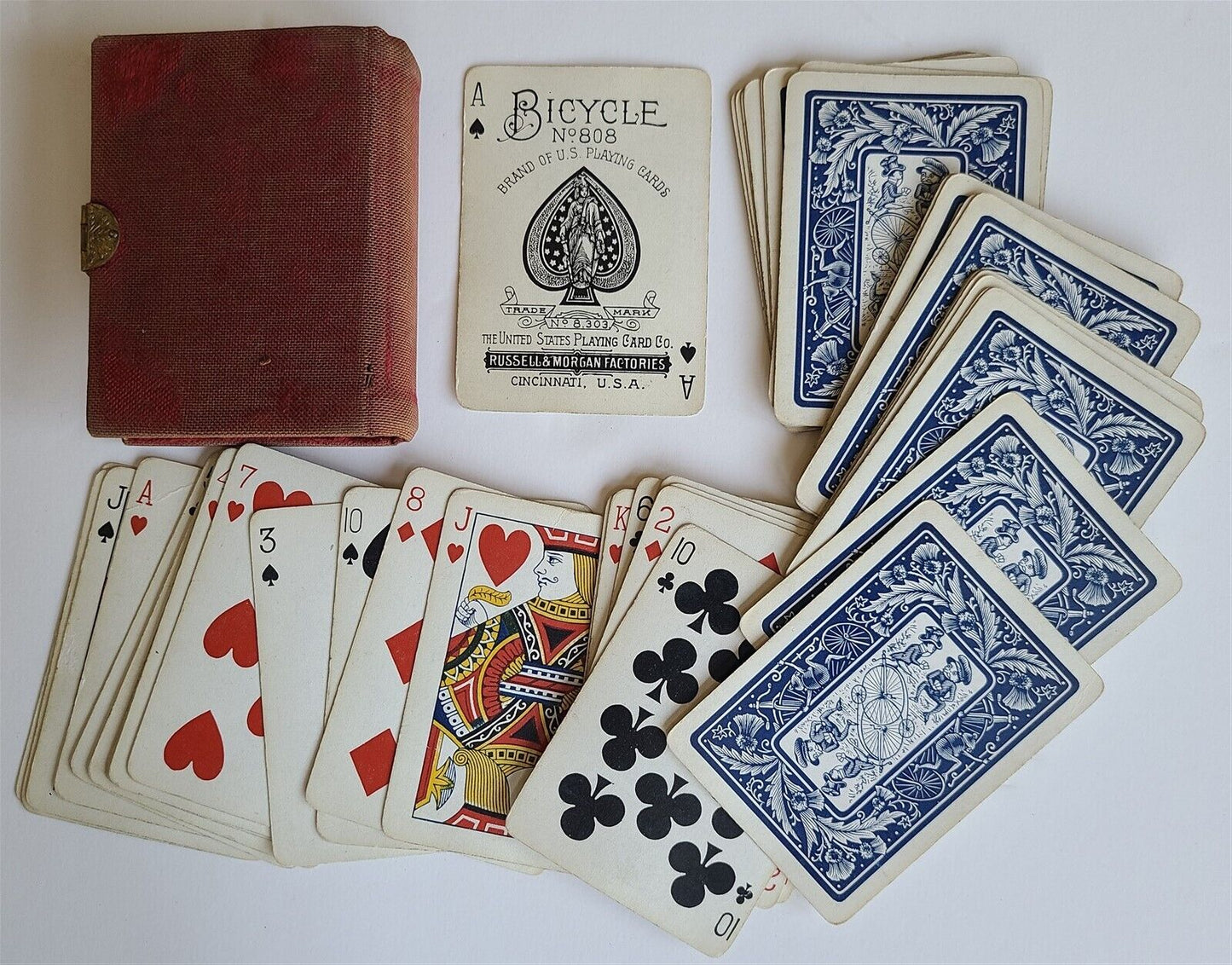 1890s BICYCLE THISTLE BACK ANTIQUE PLAYING CARDS RUSSELL & MORGAN BOOK SHAPE