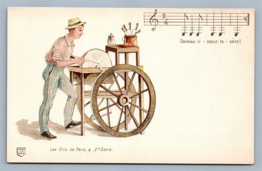 1900 PARIS EXPOSITION ANTIQUE POSTCARD STREET VENDOR TOOLS SHARPENER MUSIC NOTES