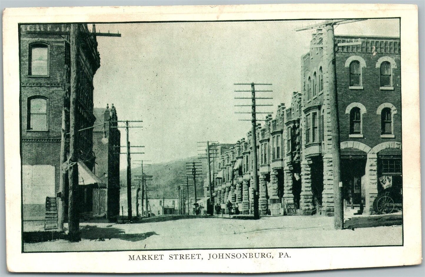 JOHNSONBURG PA MARKET STREET 1910 ANTIQUE POSTCARD w/ CORK CANCEL