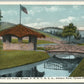 TYRONE PA FISH POND & RUSTIC BRIDGE ANTIQUE POSTCARD