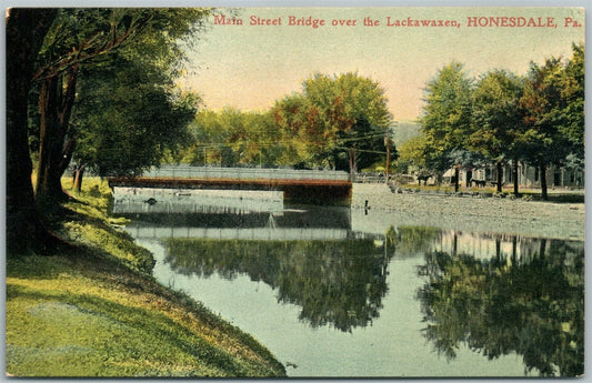 HONESDALE PA MAIN STREET BRIDGE 1909 ANTIQUE POSTCARD w/ CORK CANCEL