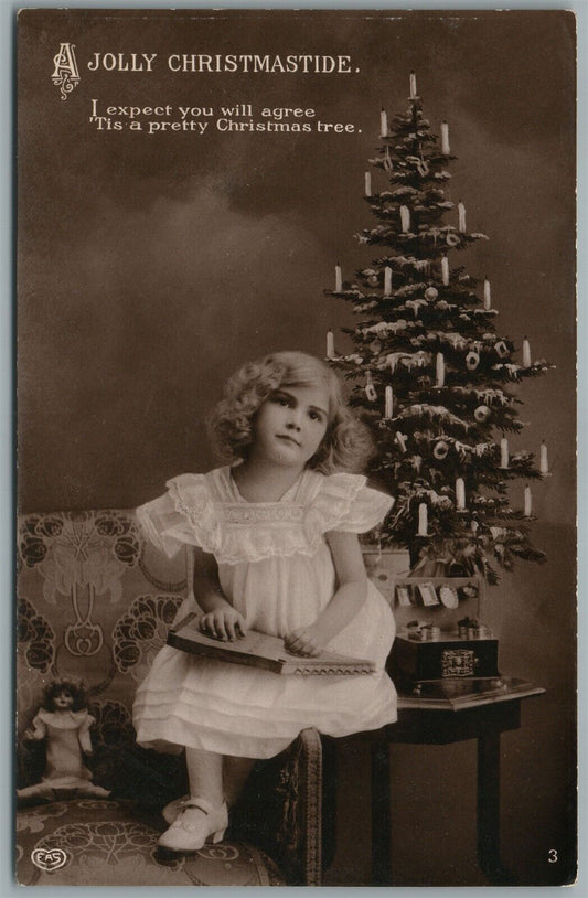 LITTLE GIRL w/ DOLL UNDER CHRISTMAS TREE ANTIQUE REAL PHOTO POSTCARD RPPC