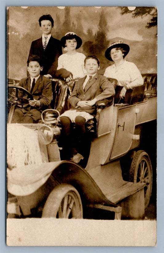 MOTHER w/ KIDS DRIVING A CAR ANTIQUE STUDIO REAL PHOTO POSTCARD RPPC