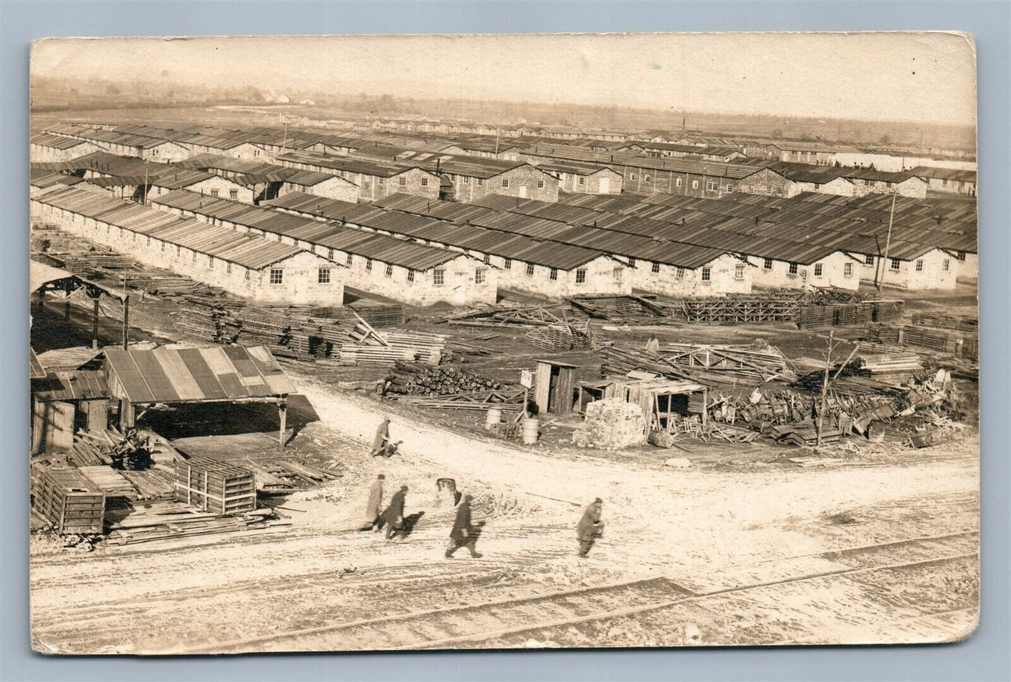 LUMBER YARD w/ RAILROAD TRACKS ANTIQUE REAL PHOTO POSTCARD RPPC