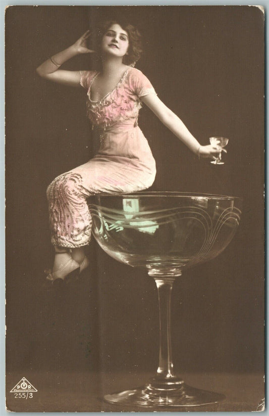 LADY on GLASS RIM DRINKING PHOTOMONTAGE 1913 ANTIQUE real photo POSTCARD RPPC