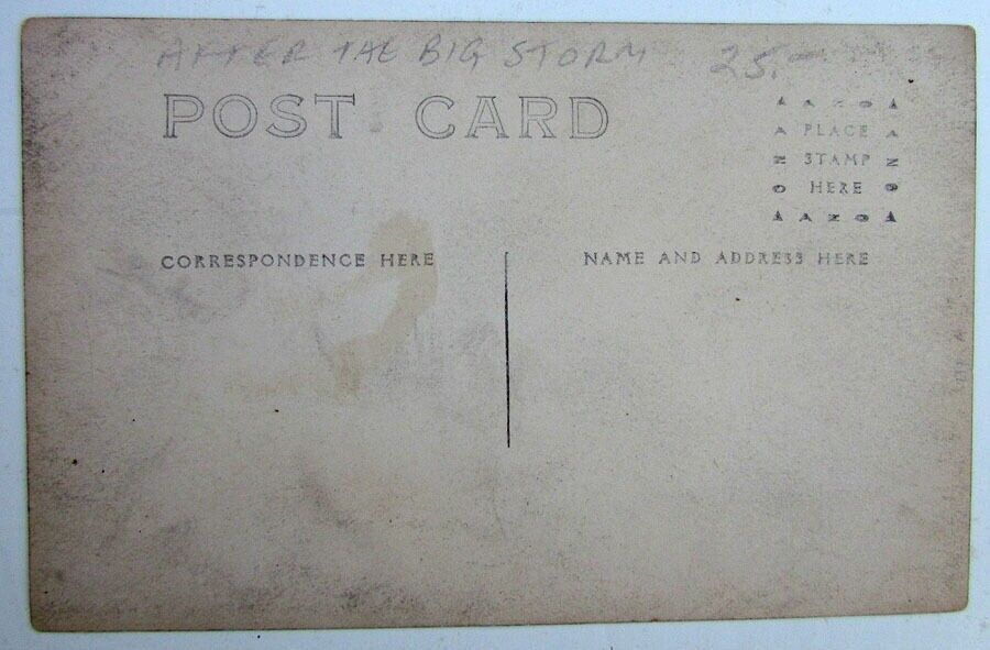 RPPC VINTAGE PHOTO POSTCARD AFTER THE BIG STORM COLLAPSED HOUSES STREET SCENE