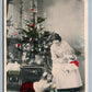 GIRL w/ DOLLS & TOY HORSE at DECORATED CHRISTMAS TREE ANTIQUE POSTCARD