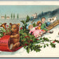 TOYS on SNOW SLEIGH CHRISTMAS ANTIQUE POSTCARD