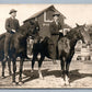 YOUNG HORSEMEN AT THE BARN ANTIQUE REAL PHOTO POSTCARD RPPC