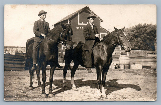 YOUNG HORSEMEN AT THE BARN ANTIQUE REAL PHOTO POSTCARD RPPC