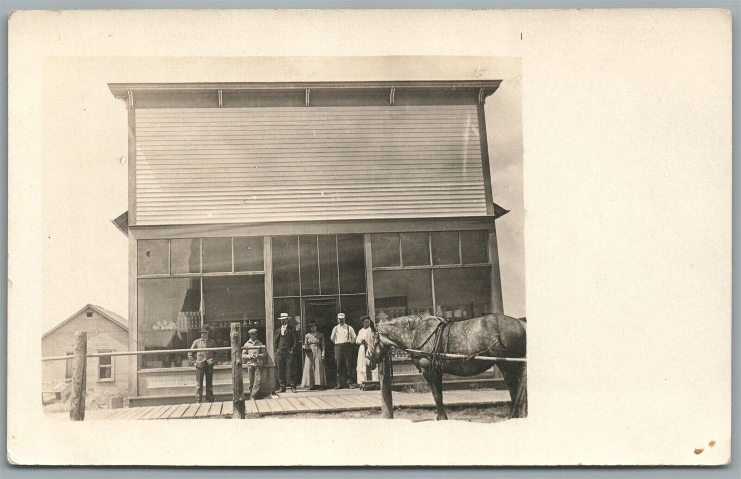 VILLAGE GROCERY STORE FRONT ANTIQUE REAL PHOTO POSTCARD RPPC