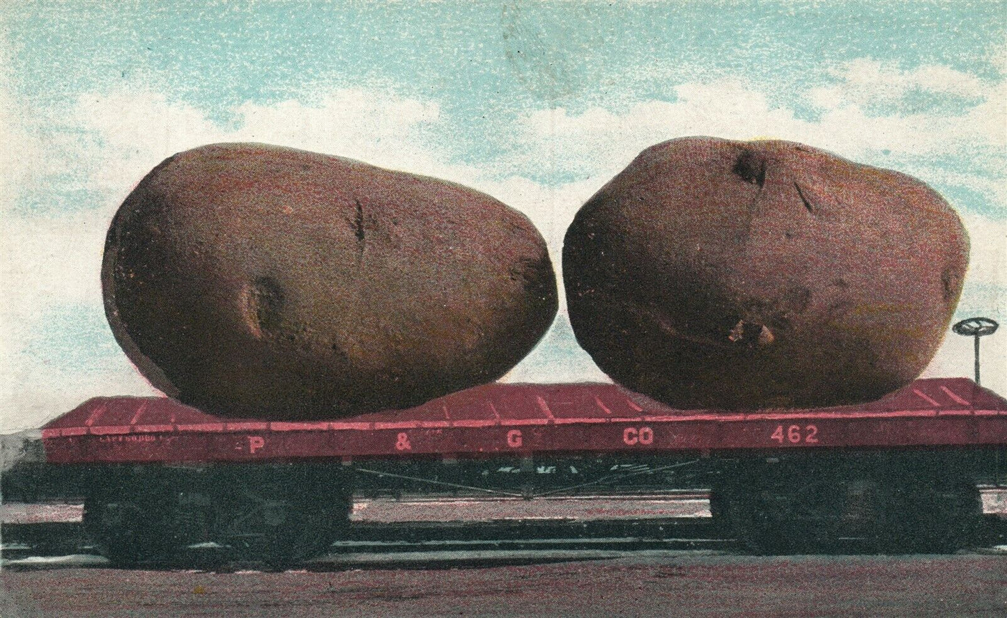 EXAGGERATED CARLOAD OF POTATO ANTIQUE POSTCARD