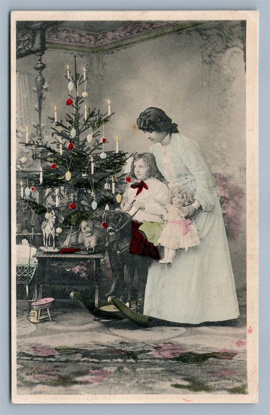 GIRL on TOY HORSE w/ DOLLS DECORATED CHRISTMAS TREE ANTIQUE POSTCARD