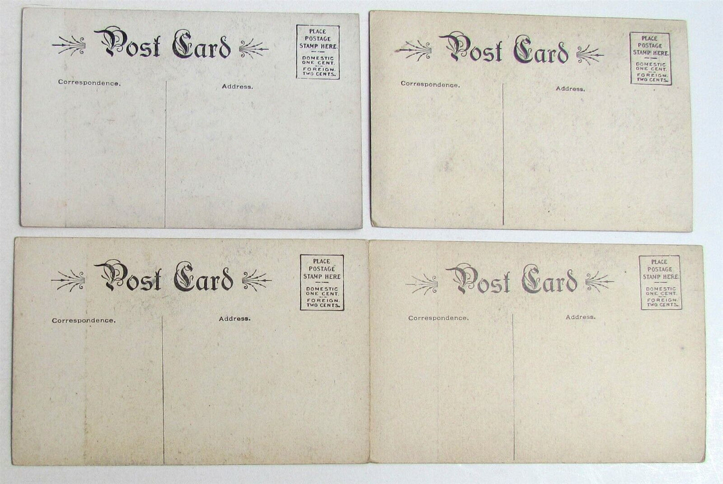 LOT OF 4 ANTIQUE RISQUE POSTCARDS