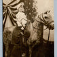 SMALL GIRL POSING ON HORSE PATRIOTIC BACKGROUND ANTIQUE REAL PHOTO POSTCARD RPPC