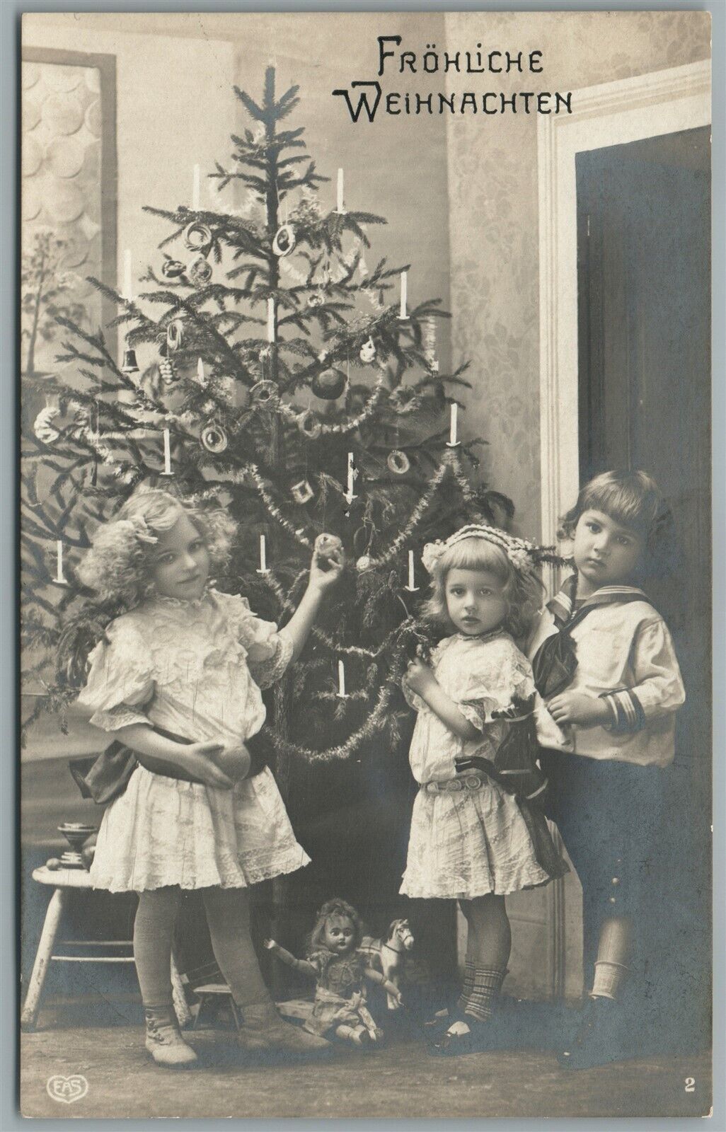 KIDS w/ TOYS UNDER CHRISTMAS TREE ANTIQUE GERMAN REAL PHOTO POSTCARD RPPC