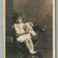 SMALL GIRL w/ PLUSH TOY DOG ANTIQUE REAL PHOTO POSTCARD RPPC