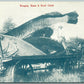 EXAGGERATED FISHING ANTIQUE 1913 POSTCARD BRINGING HOME A GOOD CATCH