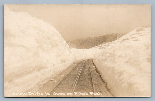 PIKE'S PEAK CO JUNE SNOW DRIFTS ANTIQUE REAL PHOTO POSTCARD RPPC railroad tracks