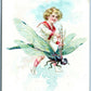 BOY RIDING FLY ANTIQUE VALENTINE POSTCARD