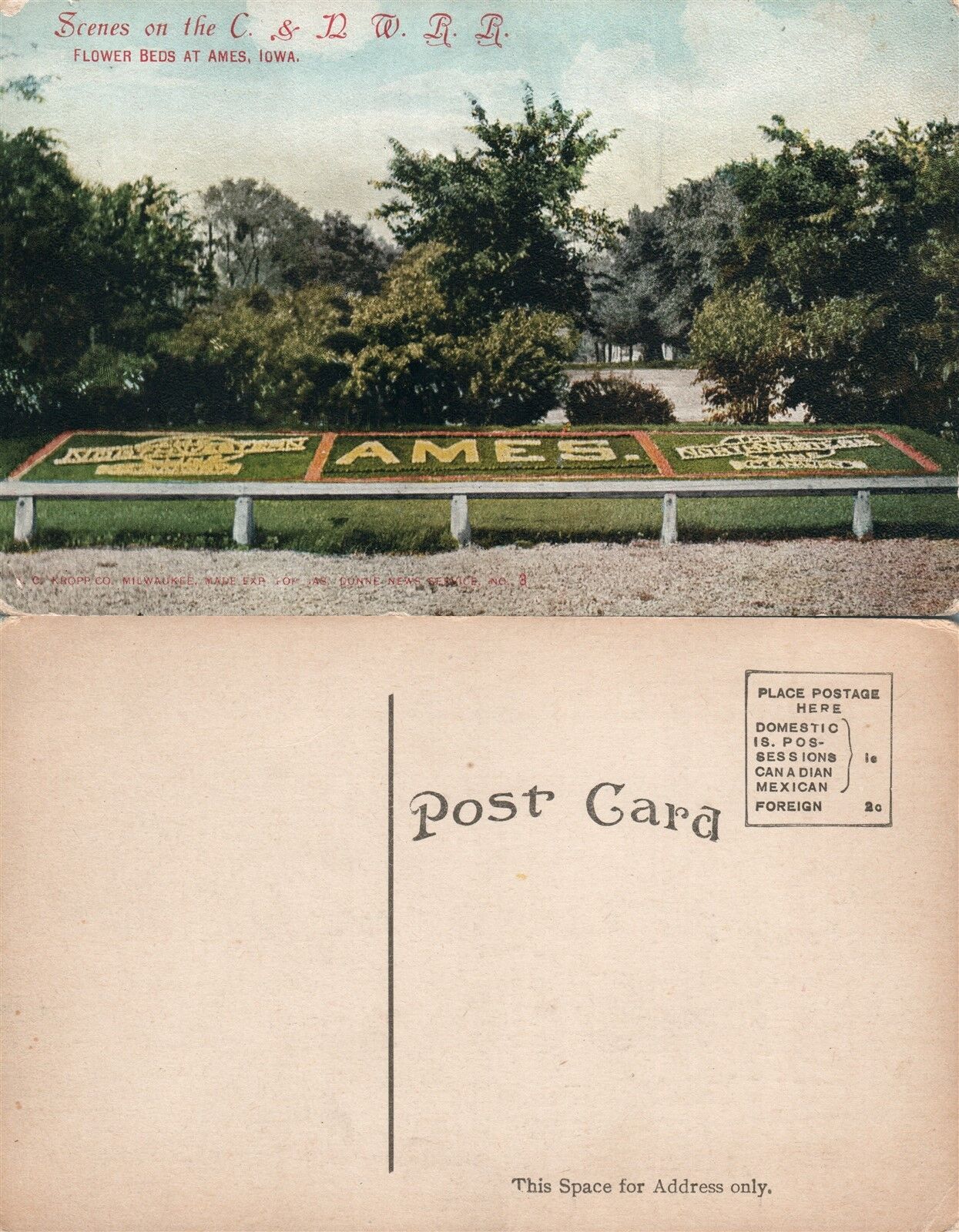 AMES IA FLOWER BEDS AT C. & N.W. RAILROAD railway ANTIQUE POSTCARD