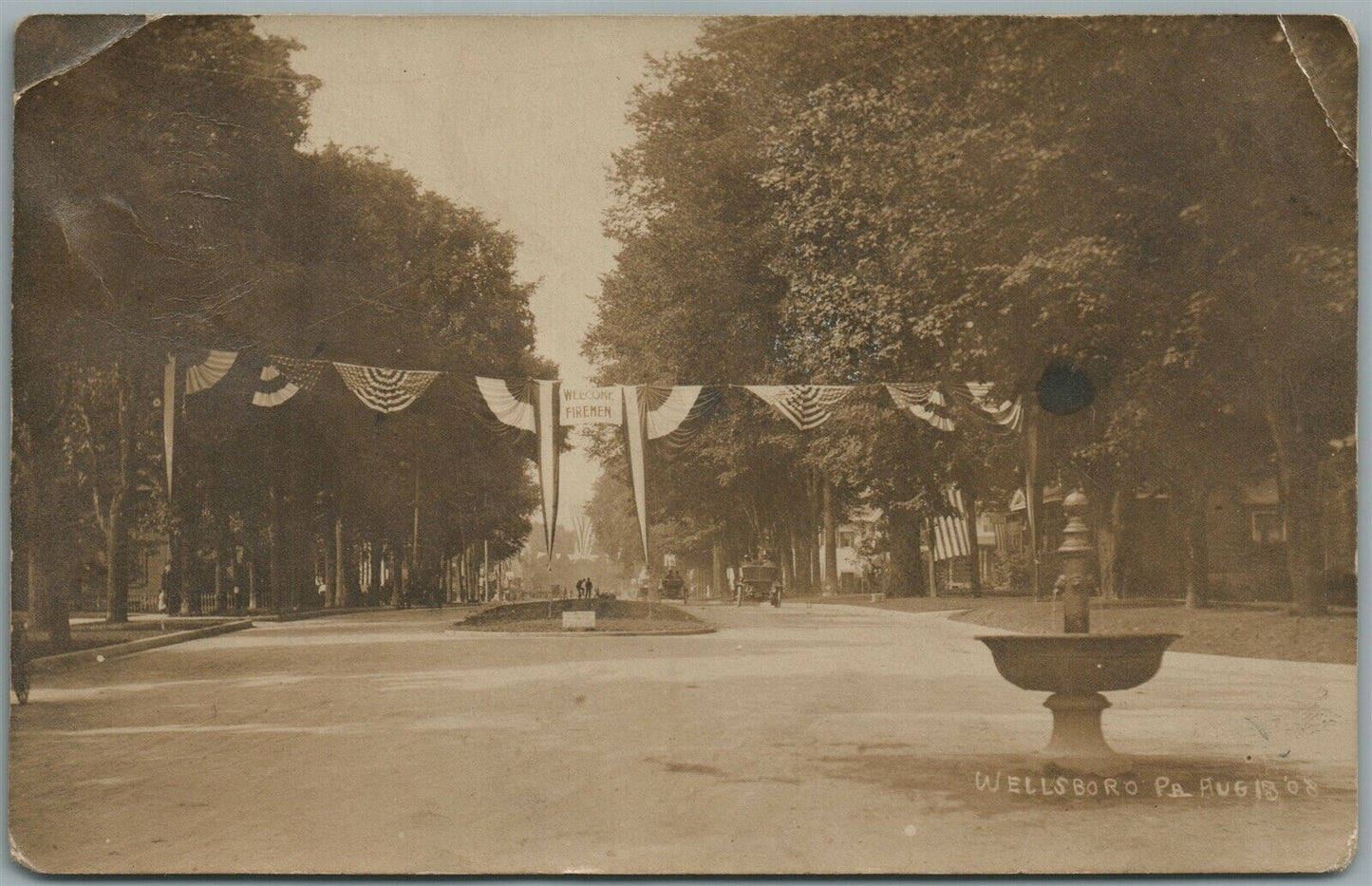 WELLSBORO PA STREET SCENE WELCOME FIREMEN SIGN ANTIQUE REAL PHOTO POSTCARD RPPC