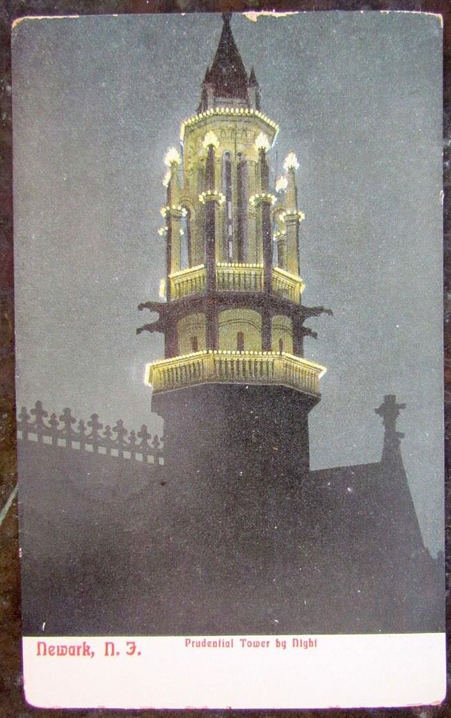 UNUSED ANTIQUE POSTCARD PRUDENTIAL TOWER BY NIGHT NEWARK N.J.