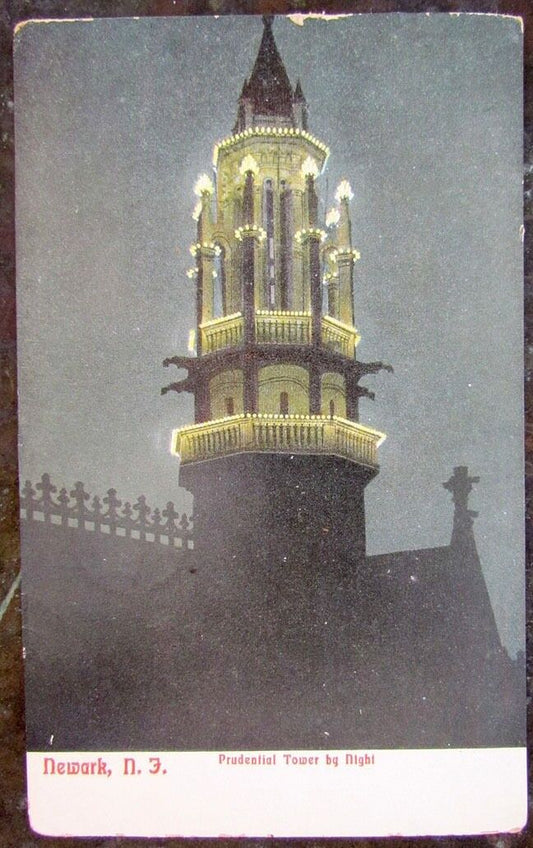 UNUSED ANTIQUE POSTCARD PRUDENTIAL TOWER BY NIGHT NEWARK N.J.